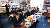 8. Students in Dr. Hugh McCormick's lower sixth politics division (year 12) sit in their classroom in Old Schools on the last day of term at Harrow School in Middlesex, Britain. (Suzanne Plunkett/Reuters)